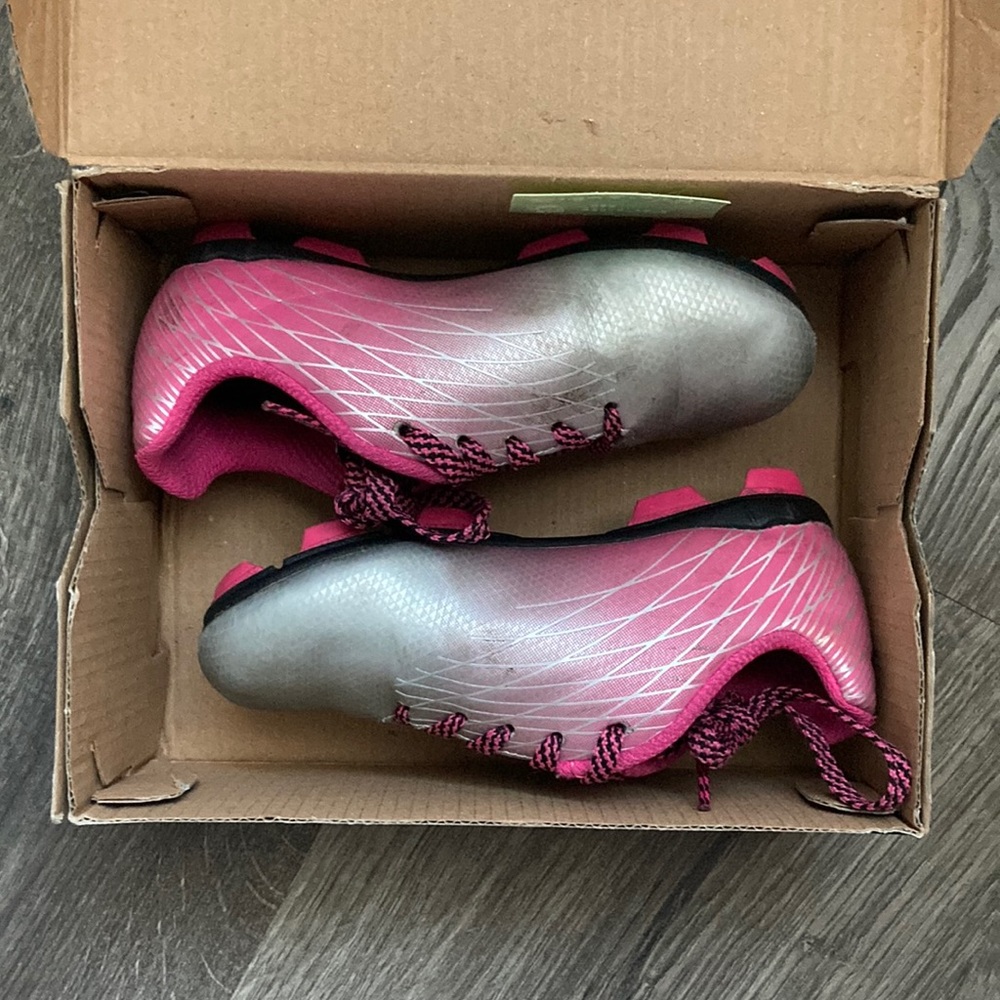 Kids soccer cleats and shin guards